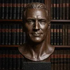 Finished bronze bust sculpture of a man, result of the custom bust from photo process.