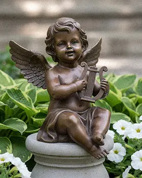 Bronze playful cherub statue playing a lyre harp in garden
