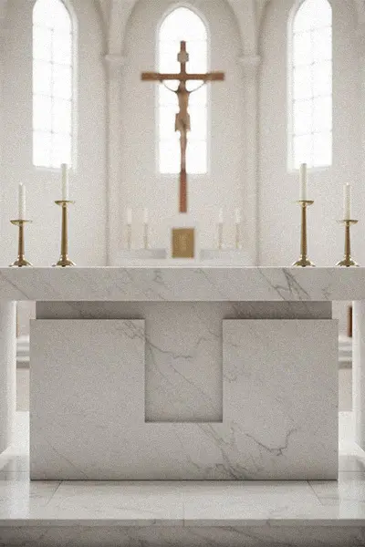 Modern white marble church altar with crucifix and candles in sanctuary