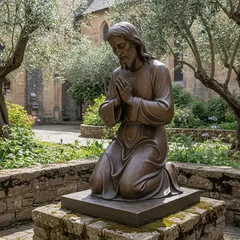 Bronze Jesus kneeling in prayer at Gethsemane garden statue