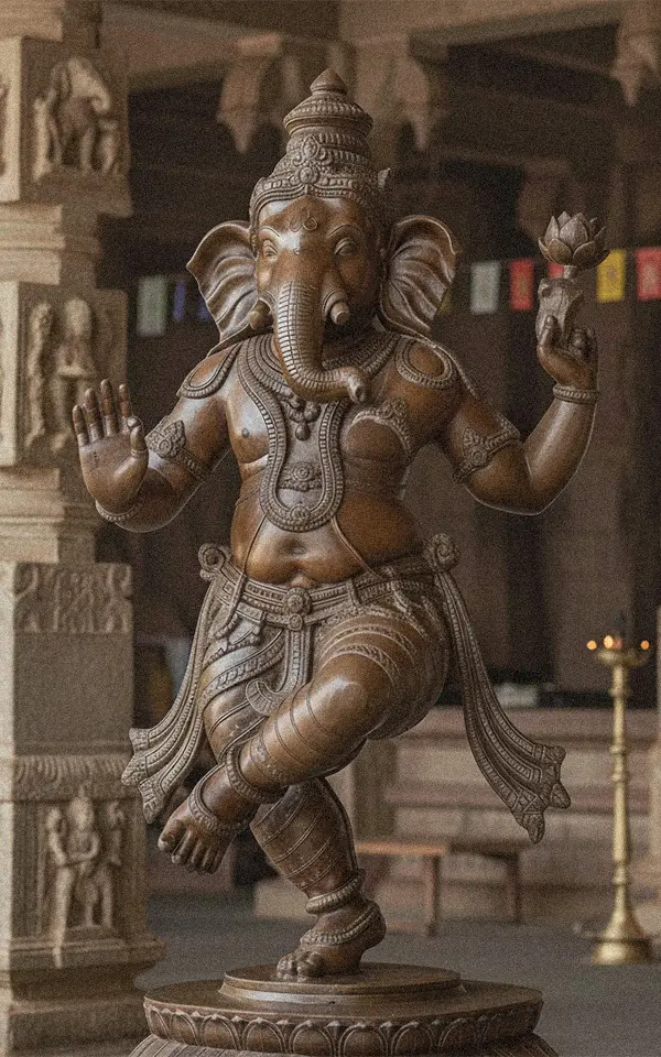 Intricate bronze Ganesha Hindu God statue, showcasing detailed Asian religious sculpture.