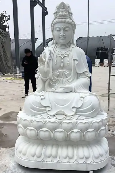Custom white marble Guanyin Bodhisattva statue for outdoor religious gardens, symbolizing peace.