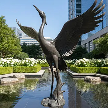 Sandhill crane garden statue doing mating dance