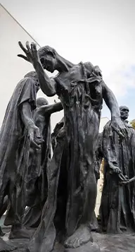 The Burghers of Calais bronze statue group showing emotional historical figures
