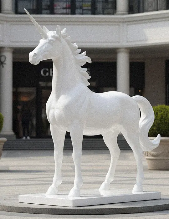 White painted life-size unicorn statue standing