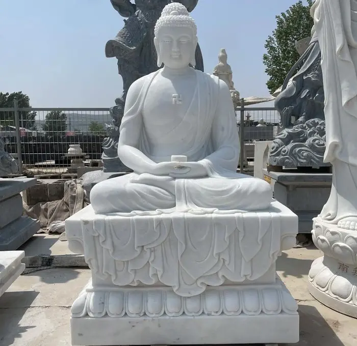 White marble Buddha statue with pure and clean aesthetics, ideal for contrast against green trees in modern styles.