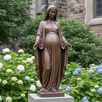Pregnant Virgin Mary statue Our Lady of Expectation in garden