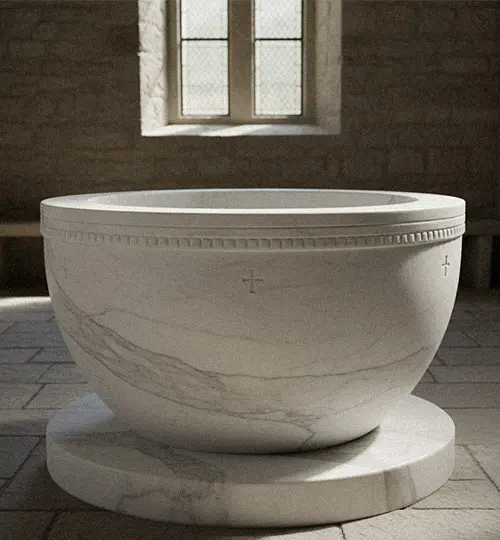 Solid natural stone baptismal font bowl showing heavy and durable texture