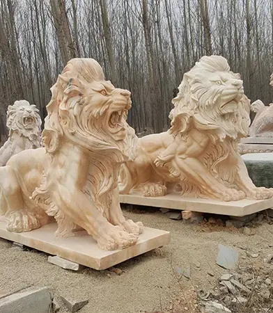 Carved marble lion statues in factory workshop