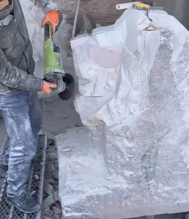 The natural marble lion statue being carved