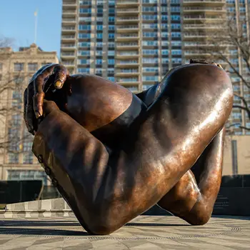 Monumental bronze abstract figure sculpture kneeling pose