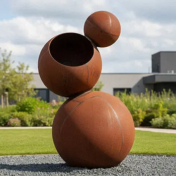 Group of three stacked corten steel spheres modern sculpture