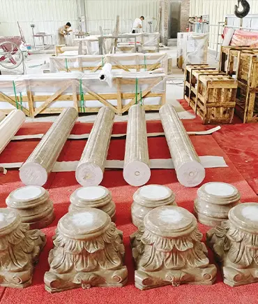 Hand carved Corinthian column capital detail in factory