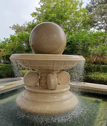 Yellow granite ball fountain water feature for garden