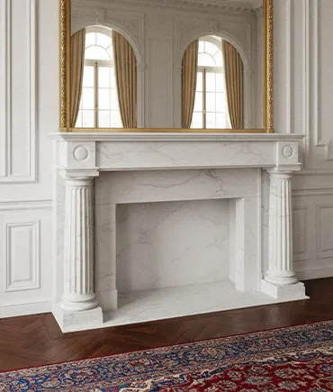 White marble fireplace mantel with round Roman columns