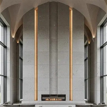 Floor to ceiling limestone fireplace wall for grand hall
