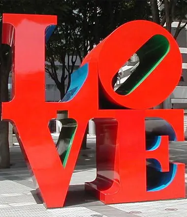 Giant red painted metal LOVE letter sculpture city landmark