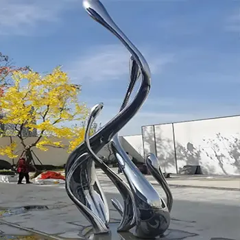 Abstract stainless steel flame sculpture flowing upward design