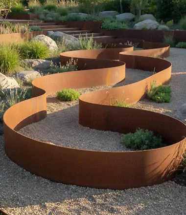 Low flowing corten steel ribbon garden edging sculpture
