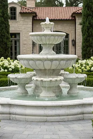 White marble tiered water fountain installation