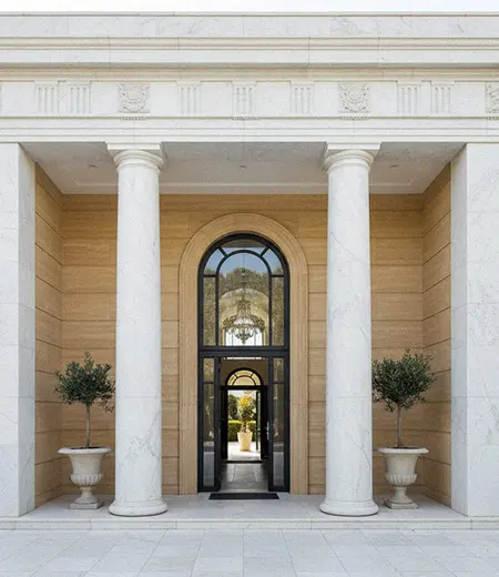 Large white marble columns entrance facade
