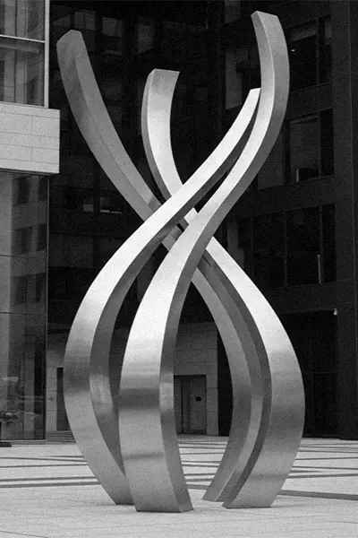 Large outdoor metal ribbon sculpture modern public art