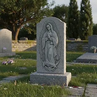 Grey granite headstone with Virgin Mary relief carving