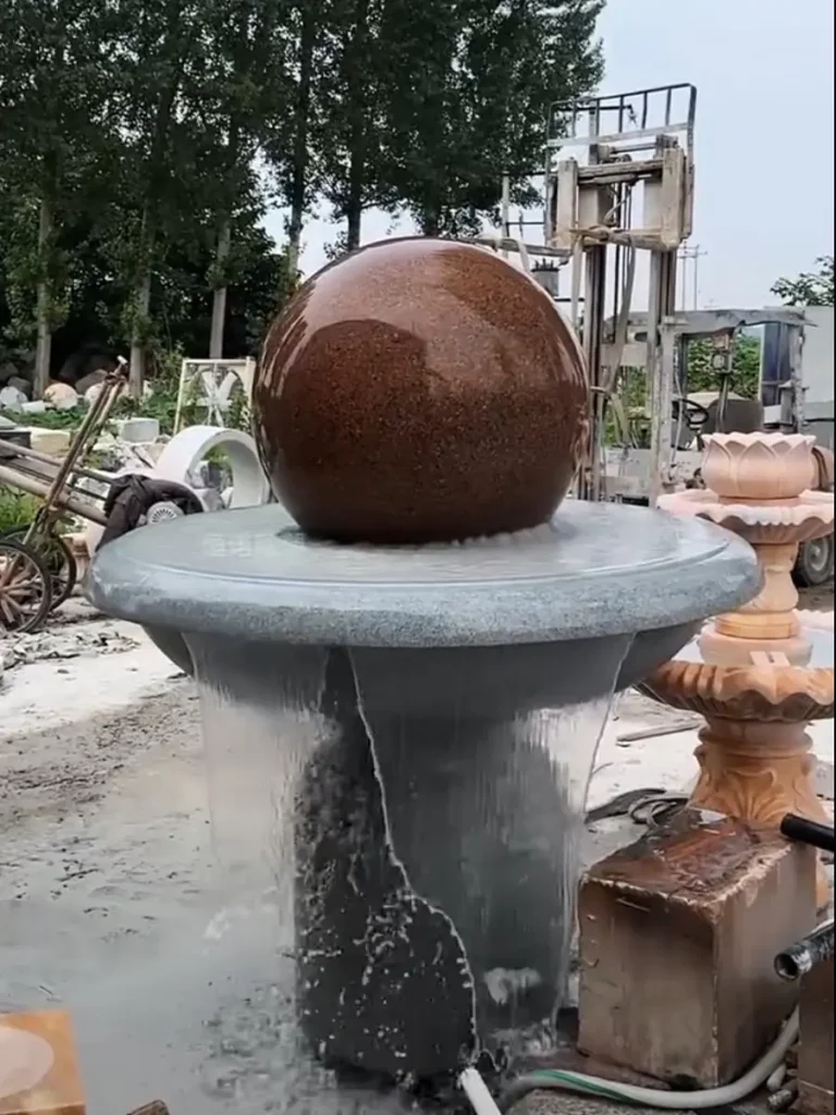 1-ton red rolling stone fountain at the factory