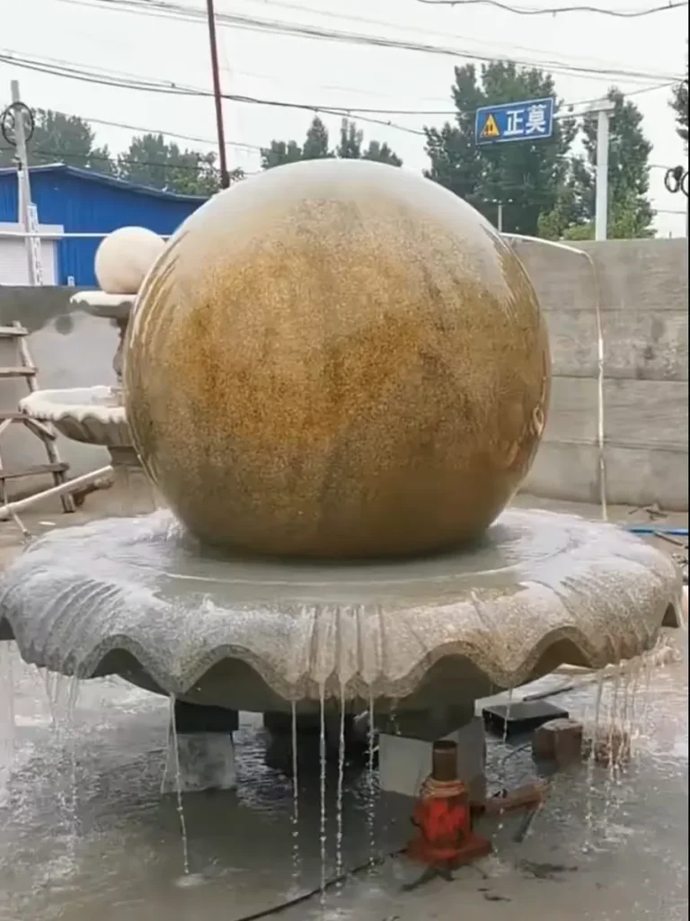 2-ton yellow rolling stone fountain at the factory