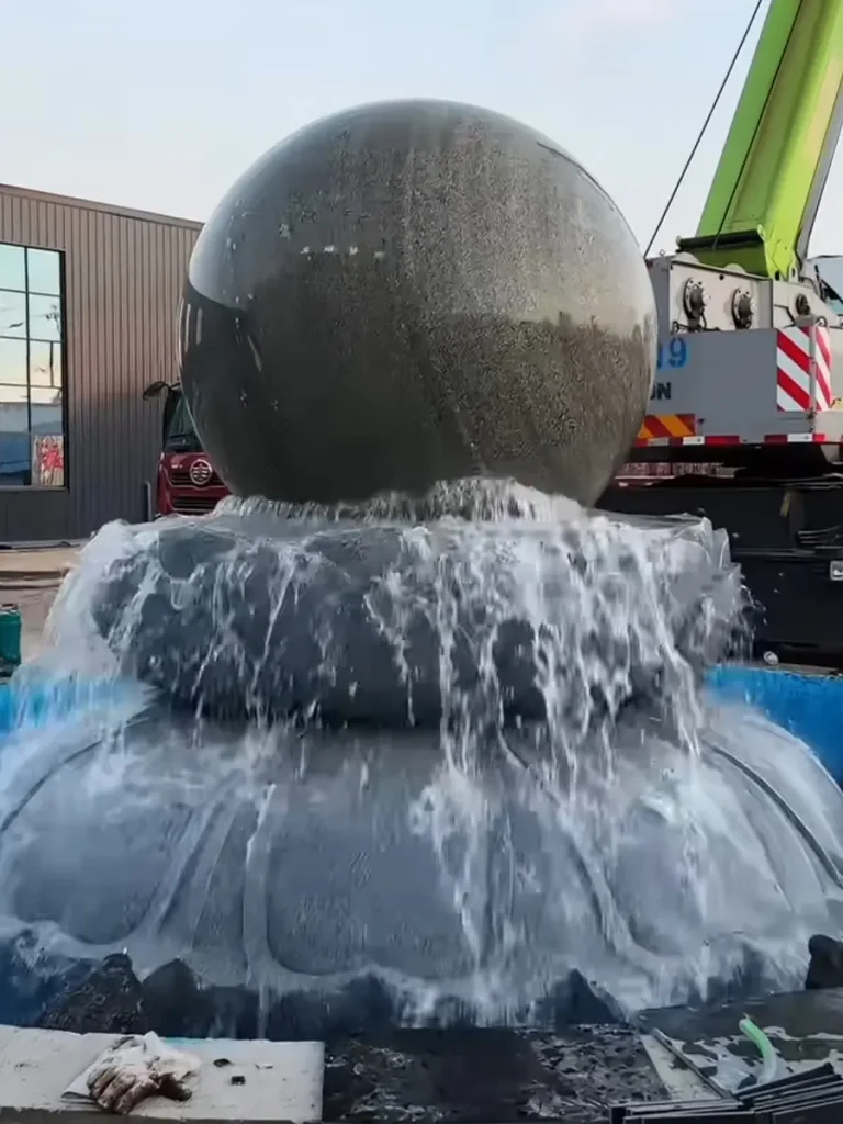 5-ton gray rolling stone fountain installation completed