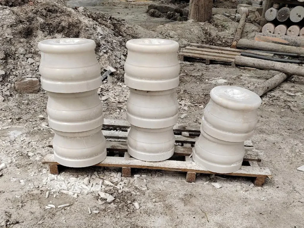 Decorative marble gazebo base pedestal featuring detailed relief carvings that increase marble gazebo price due to labor complexity