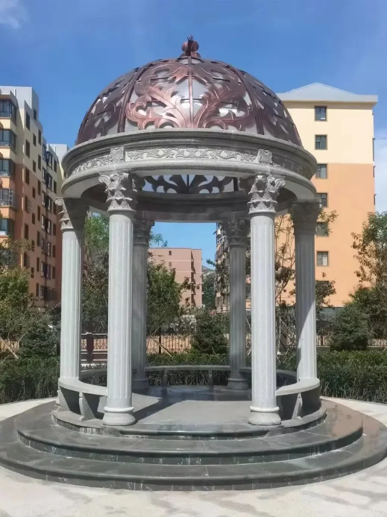 Marble estate garden structure highlighting solid stone craftsmanship and symmetry.