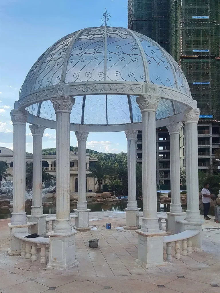 Upward view of marble gazebo dome structure after installation showing precision stone alignment and craftsmanship detail