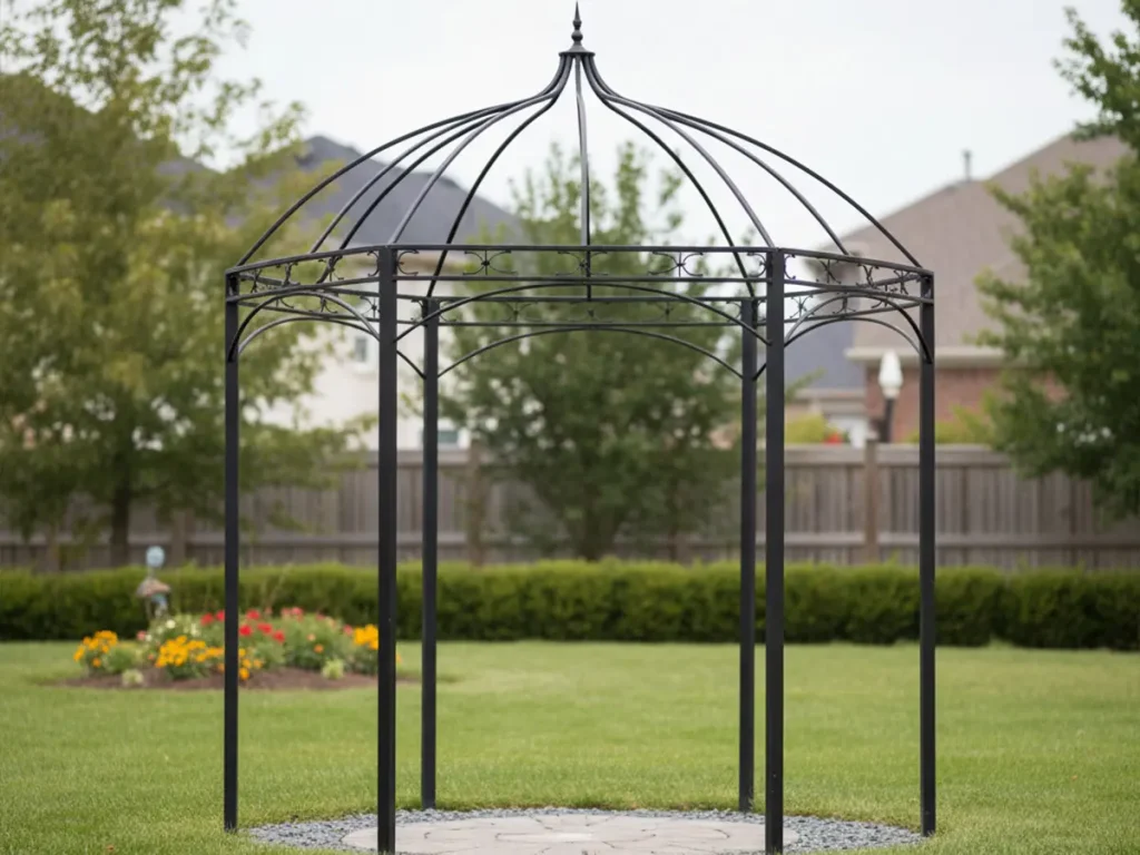 Simple wrought iron gazebo installed in backyard showing entry level iron gazebo cost example