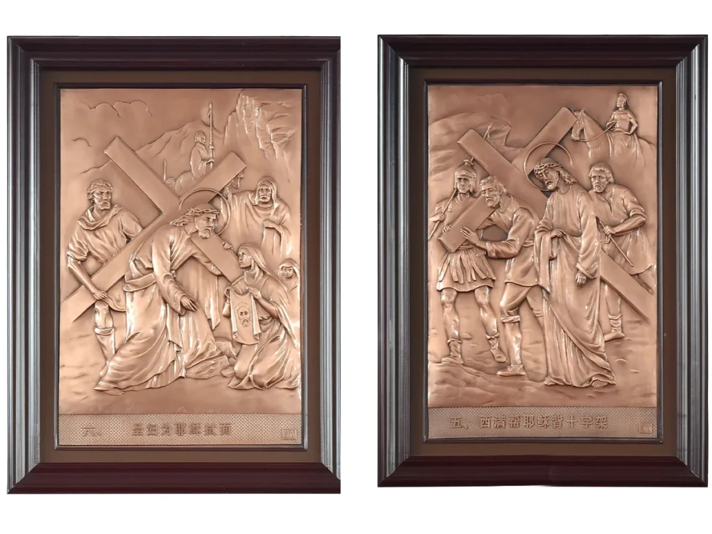 High-relief bronze Stations plaques depicting Station V Simon of Cyrene helping carry the cross and Station VI Veronica wiping the face of Jesus with deep shadow and texture