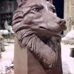 clay wolf sculpture model before bronze casting process