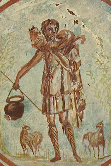 An ancient third-century fresco from the Roman catacombs depicting a young, beardless Jesus as the Good Shepherd. Carrying a rescued lamb across his shoulders and standing calmly among his flock, this remarkably preserved early Christian art illustrates the profound iconographic origins of the ancient statue of jesus christ is the good shepherd, transforming the Greco-Roman Criophoros into a permanent theological symbol of divine protection.