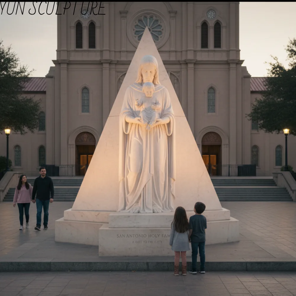 A large-scale marble Holy Family statue in a parish entrance plaza, demonstrating the spatial requirements and visual impact of landmark-size sculptures.