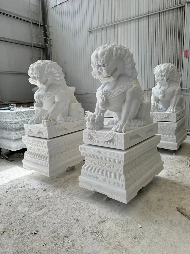 White marble Chinese Foo Dog guardian lion statue pair at factory