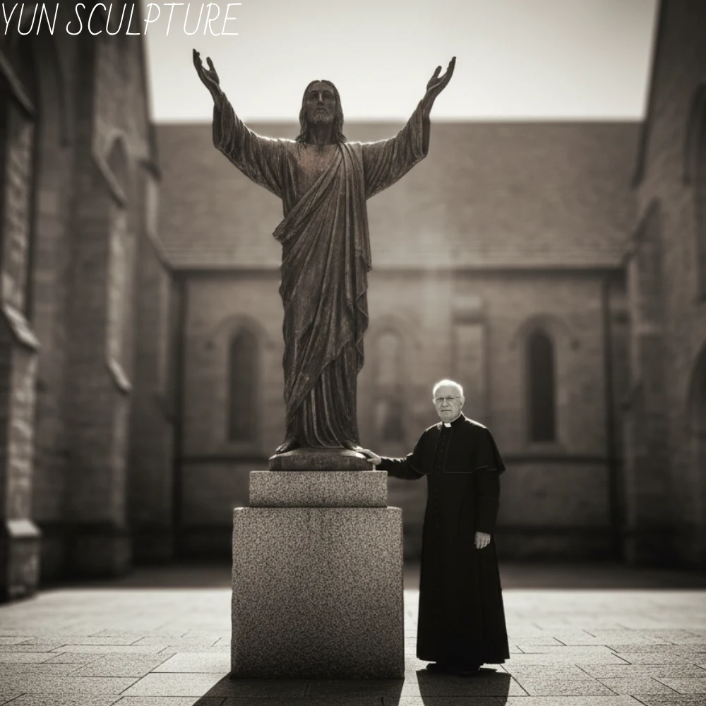A monumental bronze Risen Christ statue with triumphantly raised arms standing outside an ancient church, accompanied by a priest at its pedestal. Featured image for the ultimate guide to custom bronze resurrection statues.