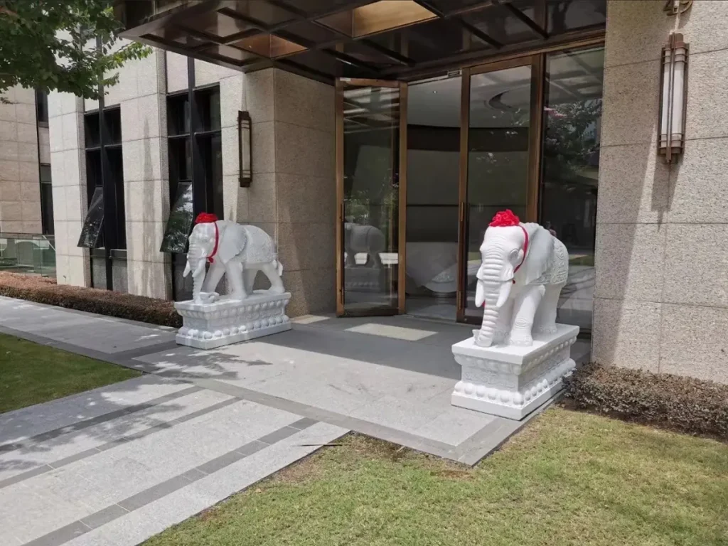 Stone elephant statue placed near the front door according to feng shui