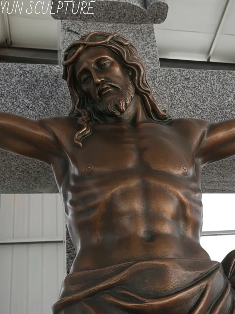 A highly detailed close-up of the muscular torso and outstretched arms of a monumental bronze Jesus statue. The flawless, dark bronze finish perfectly illustrates how individual cast sections are seamlessly TIG welded on-site, with weld points expertly chased and patinated to match the surrounding surface, ensuring structural integrity without compromising aesthetic reverence.