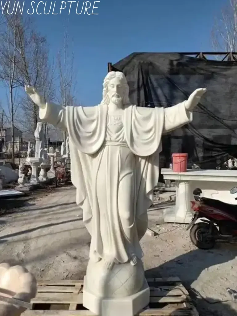 A full-length true statue of the sacred heart of jesus expertly hand-carved from white marble, standing majestically upon a sculpted globe base. The intricate stone chiseling precisely captures the six core theological elements, ensuring the flames and the wound are anatomically and symbolically balanced to radiate divine love.