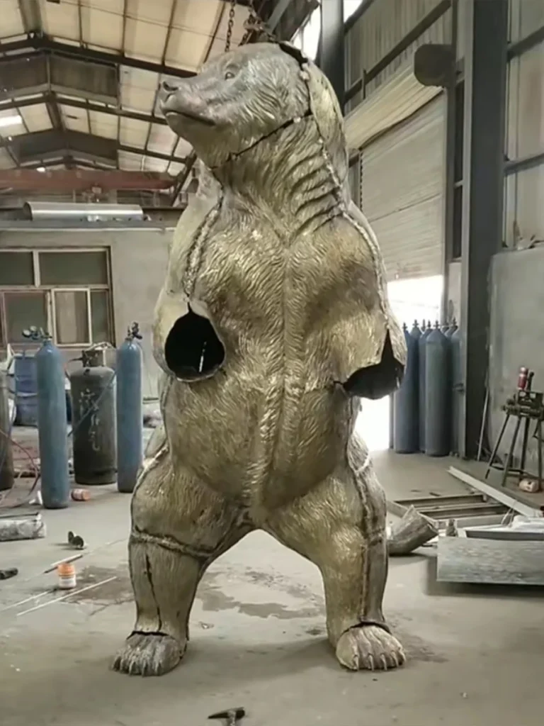 welding raw bronze bear sculpture foundry assembly