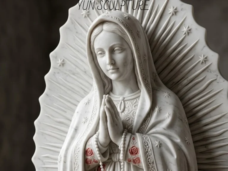 A natural stone Our Lady of Guadalupe statue placed in a lush prayer garden, demonstrating how the material's soft tones harmonize with natural architectural surroundings and outdoor sanctuaries.