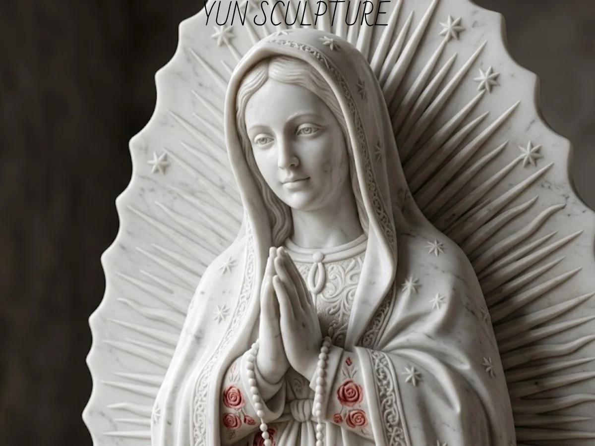 Close-up detail of marble Our Lady of Guadalupe statue face and veil