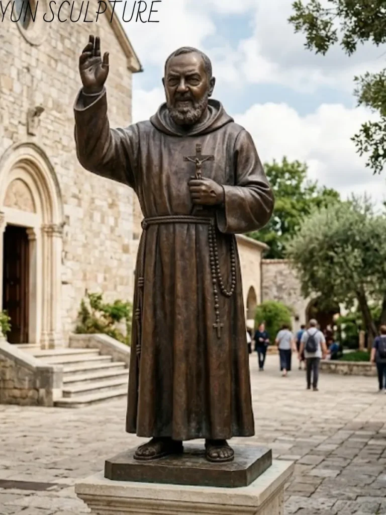 A detailed Saint Padre Pio bronze sculpture featuring the visible tradition with stigmata wounds revealed on the palms, designed for church pilgrimage sites and collective witness.