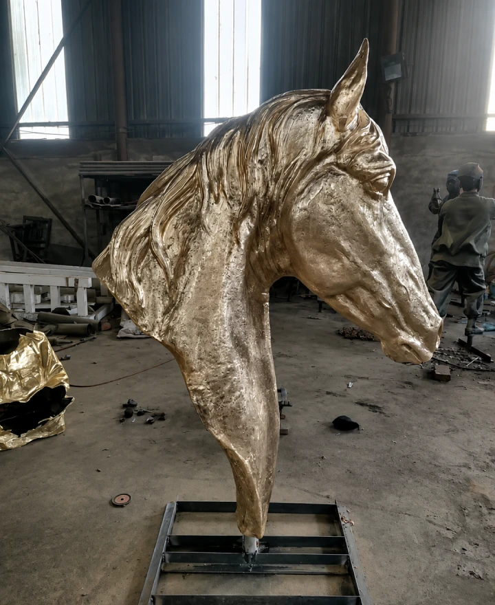 Large bronze horse head bust sculpture in factory workshop — Yun Sculpture