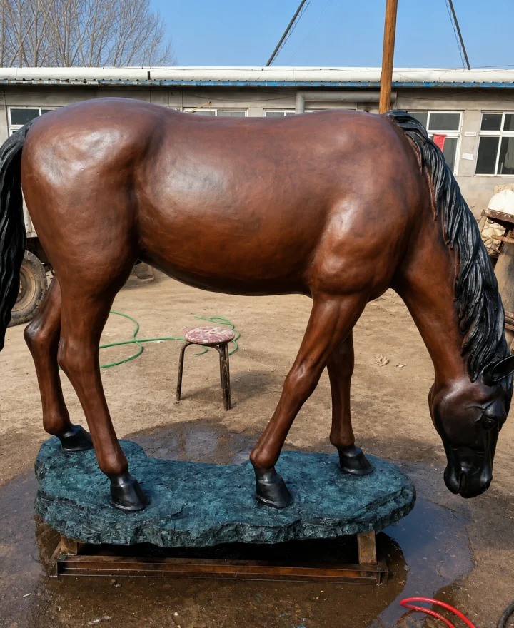 Life-size bronze standing horse statue on green base — Yun Sculpture