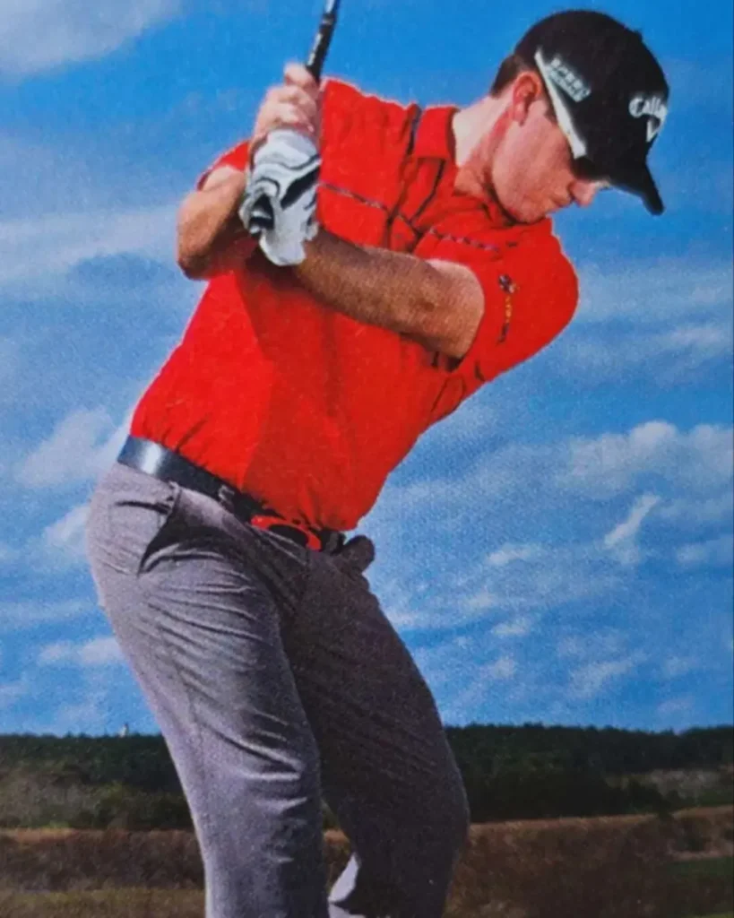 The original action photo of a golfer provided by a client, serving as the visual blueprint for a custom-made life-size bronze golf sculpture.